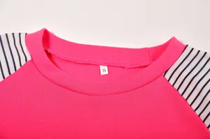 Women's striped raglan sleeve crewneck t-shirt detail view, pink and black style.