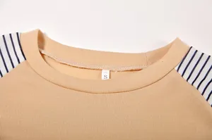 Detailed view of women's round neck raglan striped long sleeve t-shirt collar size S