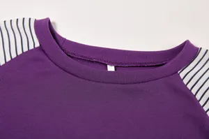 Women's purple raglan black white striped long sleeve t-shirt collar detail close up