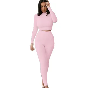 Pink long sleeve crop top and leggings two piece workout tracksuit for women activewear set