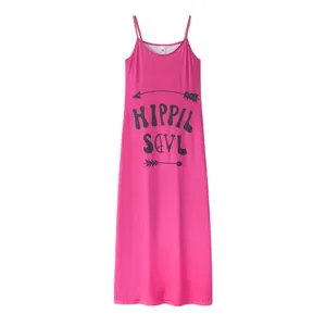 Detailed view of the pink maxi slip dress featuring stylish hippie soul chest print and straps.