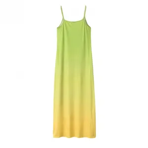 Green to yellow gradient maxi slip dress detail view showing slim fit long apparel design.