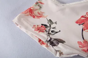 Women floral print short sleeve dress fabric detail close up shot for summer wear