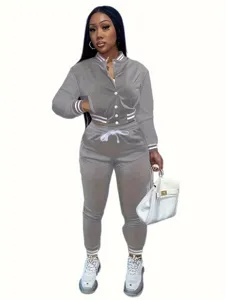 Tuta sportiva casual da donna giacca bomber tinta unita e pantaloni per autunno.