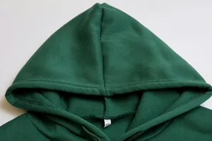 Green hoodie fleece lined sweatshirt hood detail, comfortable casual apparel close up view