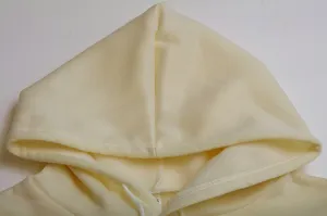 Close-up detail of the cozy fleece-lined hoodie hood with adjustable drawstring cord.