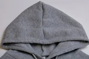 Detailed view of women grey fleece lined hoodie hood, cozy winter casual sweatshirt top.
