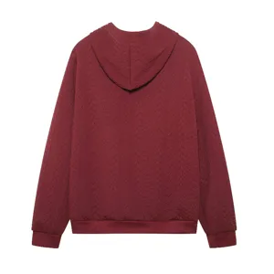 Back view detail of dark red textured long sleeve hoodie with hood, comfortable loose fit.