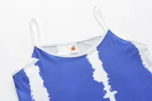 Blue and white striped camisole top with thin white straps and neckline detail for women.