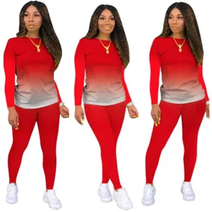 Gedetailleerd overzicht van de dames gradient lange mouwen top en sportbroek set.