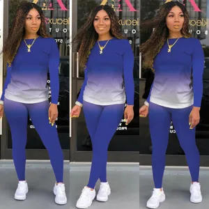 Stijlvolle tweekelige sportset voor dames met lange mouwen top en leggings met degrade.