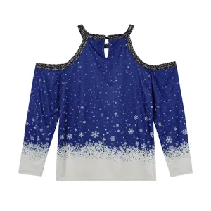 Women cold shoulder long sleeve blue top with winter snowflake print and glitter trim.
