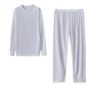 Set tuta con maglia a maniche lunghe e pantaloni tinta unita, abbigliamento comodo e casual.