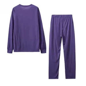 Set top a maniche lunghe e pantaloni tinta unita da donna, comodo abbigliamento casual.