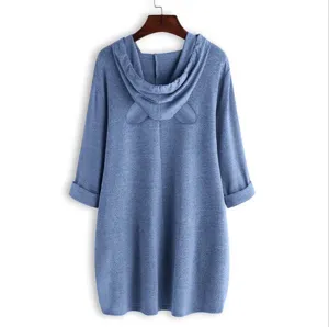 Detailed view of the blue knitted hooded top featuring cute cat ears and long sleeves.