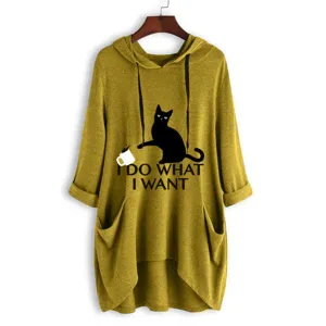 Mustard yellow knit hooded sweatshirt featuring cute cat graphic print and irregular hem detail.