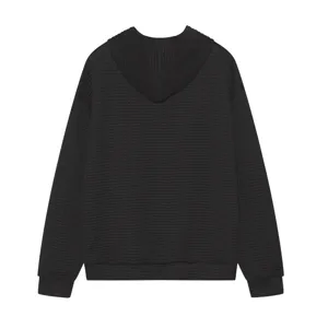 Back view detail of women solid black waffle knit long sleeve hooded sweatshirt top.