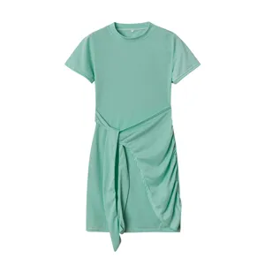 Mint green short sleeve crew neck dress with waist tie and irregular ruched detail.