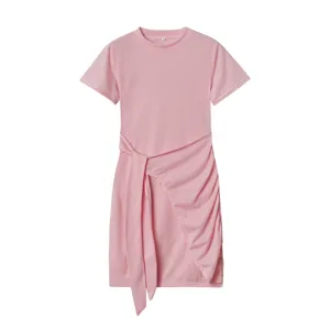 Pink short sleeve crew neck dress detail featuring a chic waist tie and side ruching.