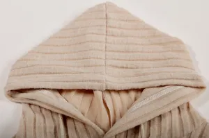 Close-up detail of the ribbed knit hood on a cozy casual fall winter pullover hoodie sweater.