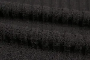 Close-up detail of black ribbed fleece knit fabric showing soft texture and high quality.