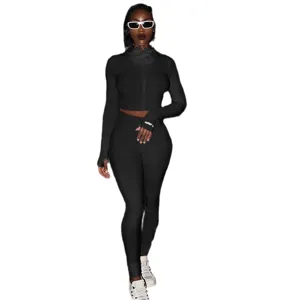 Μαύρο ριμπ σετ γυμναστικής με crop top μακρυμάνικο και κολάν για γυναίκες