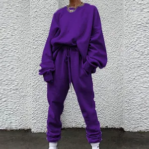 Detailed view of the purple oversized sweatshirt and sweatpants casual lounge set.