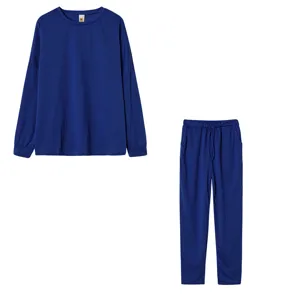 Solid color long sleeve top and casual pants loungewear set for women daily wear.