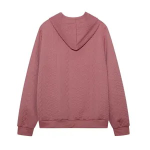 Women's plus size casual solid color hooded sweatshirt with long sleeves and knit texture.