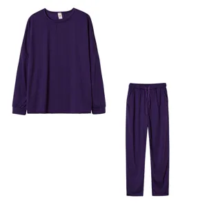 Deep purple solid long sleeve top and pants lounge set detail showcasing soft fabric.