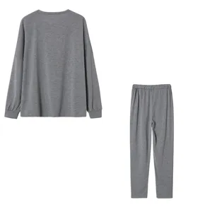 Detailed view of the grey casual long sleeve top and pants set back, comfortable loungewear.