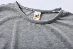 Gray long sleeve top collar detail showing size tag and soft knit fabric texture.