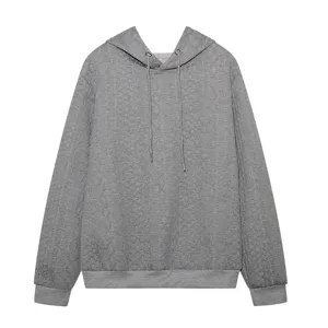 Jacquard hooded long sleeve sweatshirt detail, casual grey pullover showcasing fabric texture.