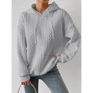 Casual long sleeve grey hooded sweatshirt for women, comfortable loose fit textured pullover.