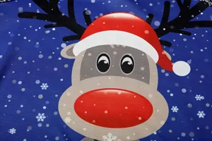Close-up detail of Christmas elk print, showcasing vibrant fabric texture and festive design.
