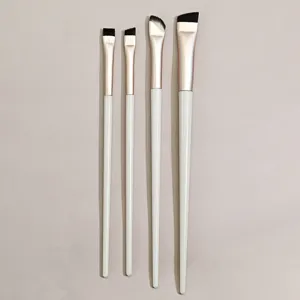 4-teiliges Make-up-Pinsel-Set mit weißen Griffen und schrägen Borsten für präzise Augen-Details.
