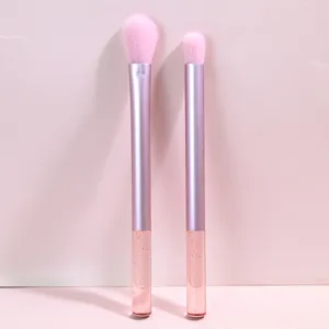 Detail view of the 2-piece pink crystal handle makeup brush set for soft and smooth application.