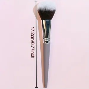 Soft makeup powder brush with grey handle and silver ferrule for flawless daily facial makeup.