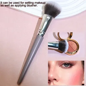 Olive purple makeup brush for setting powder and blusher application with soft bristles.