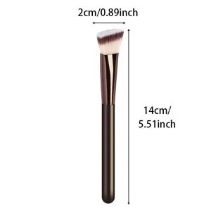 Detail view of the angled foundation makeup brush showing precise bristle shape and dimensions.