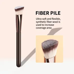 Detailed view of the angled foundation makeup brush showcasing soft synthetic bristle fibers.