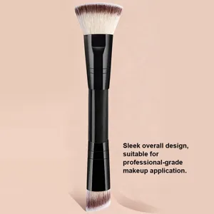 Detail view of the professional double-ended makeup brush showing fine bristles and sleek handle.