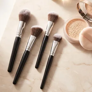 Professional 4-piece makeup brush set with black handles and soft synthetic bristles.