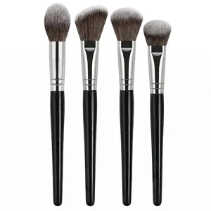 4-piece professional makeup brush set with black handles for powder and foundation application.