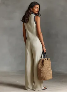Women's minimalist linen blend sleeveless jumpsuit featuring a chic stand collar and front zipper.