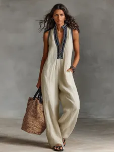 Elegant linen blend sleeveless jumpsuit with front zipper and stand collar for women.