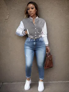 Details of women colorblock varsity jacket, casual single-breasted baseball outerwear for autumn.