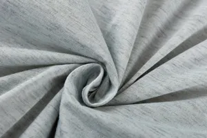 Grey heathered fabric detail close-up, soft knit texture and soft drape for custom dress.