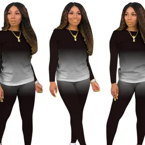 Dames tweedelig casual sportkleding outfit met gegradueerde lange mouwen top en broek.