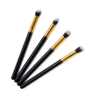 Set of 4 small eyeshadow brushes with black handles and gold ferrules for precise eye makeup.